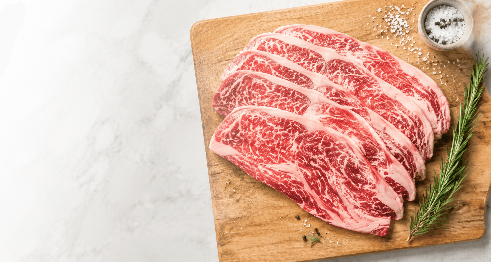 Premium beef cuts on a wooden board